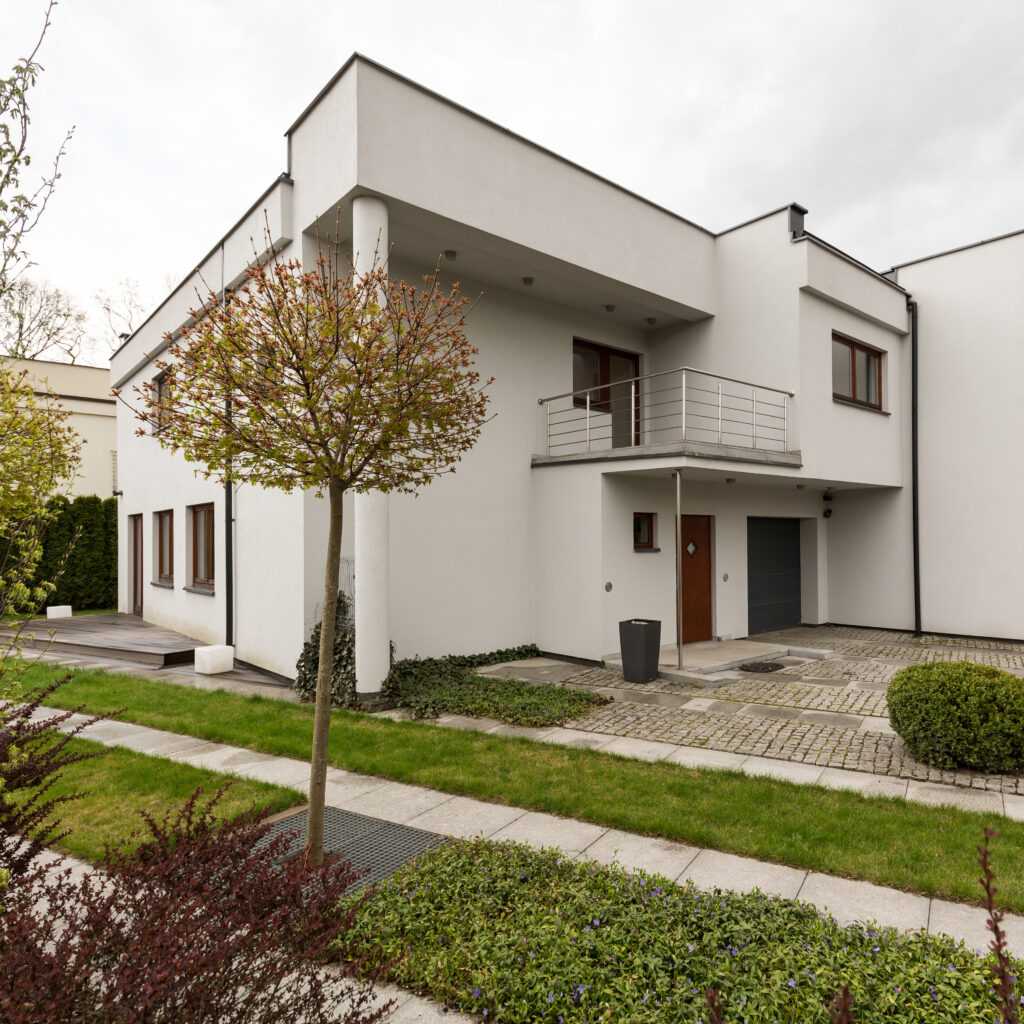 White mansion with garden